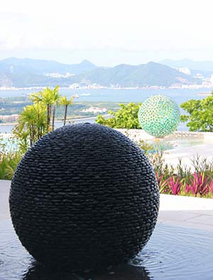 David Harber sculptures and water features add character to a Hong Kong property in a spectacular setting