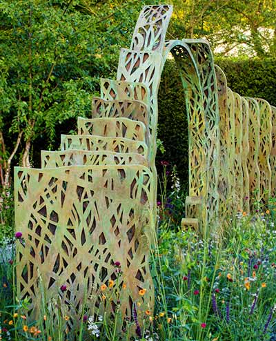 Bronze screen representing our early attempts to enclose the environment