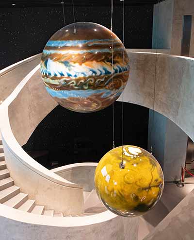 Planet sculptures hanging in the foyer of Al Thuraya planetarium