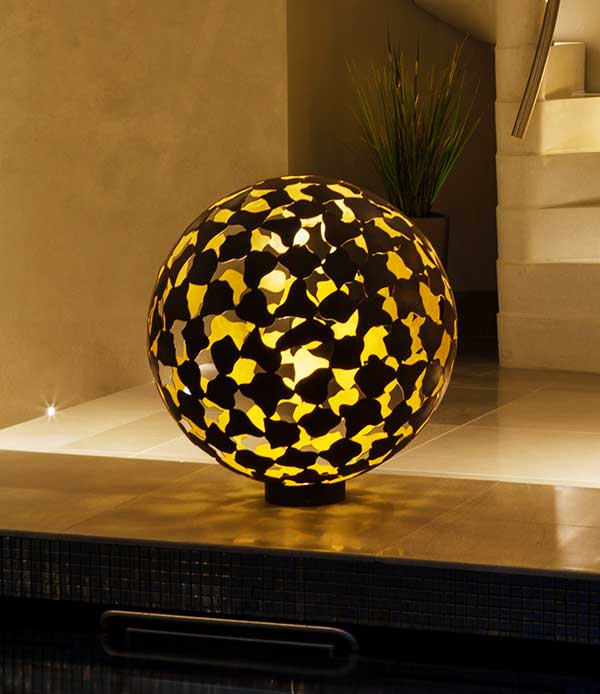Interior mantle sculpture by an indoor swimming pool