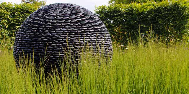 Dark Planet sphere in grass