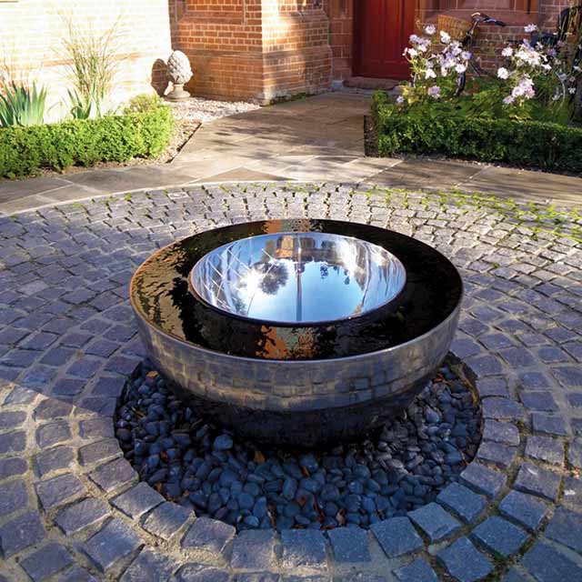 Chalice water feature as garden centrepiece
