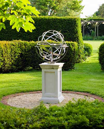 Armillary sundial in a formal garden