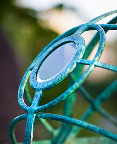 Detail of Armillary30 sculpture showing interactive lens and orb