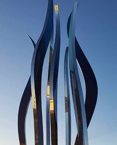 Hydra tree sculpture rises high in the sky