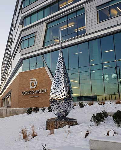 Hundreds of stainless steel petals welded together to form a giant water droplet