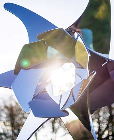 Propeller sculpture for Saga cruise ship in bright sunlight