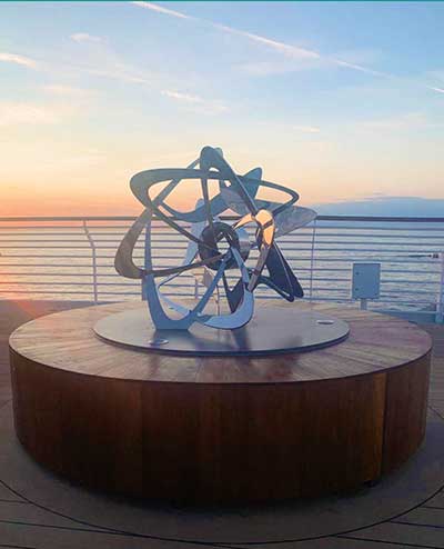 Propeller sculpture for Saga cruise ship at sunset