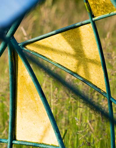Detail of the Matrix bronze and stainless steel garden sphere