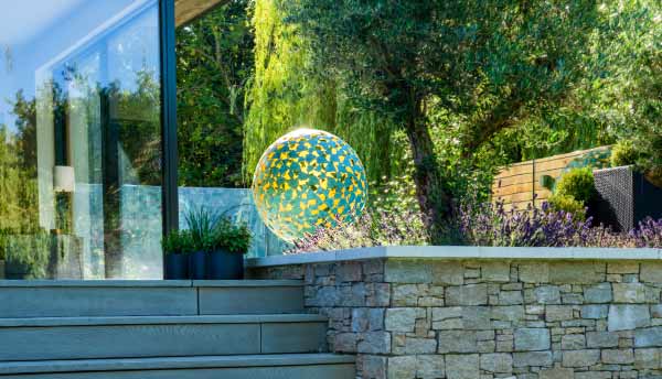 Mantle sculpture in a contemporary garden