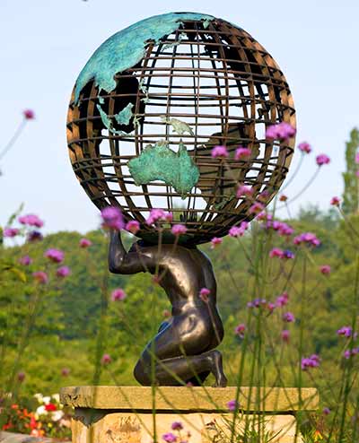 Statue of Atlas supporting a bronze globe