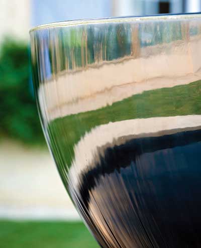 Reflections on the mirror-polished stainless steel surface of the Chalice