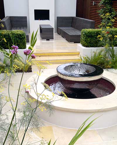 Chalice as the central feature in a hard landscaped garden