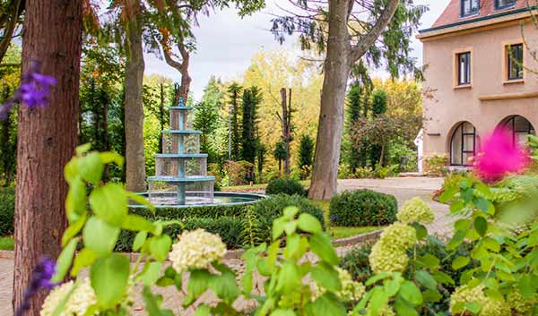 Crucello tiered water fountain in a garden