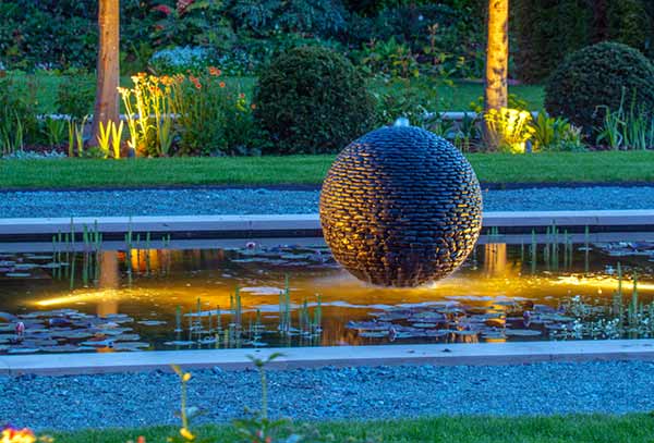Dark Planet stone sphere water feature