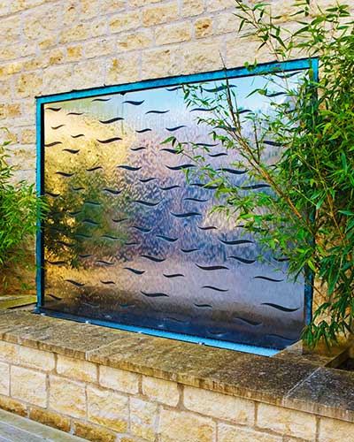 Bronze Waves patterned water wall